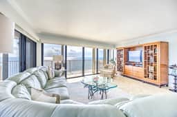 Premier Oceanfront Top Floor Condo With Wraparound Balcony & Windows